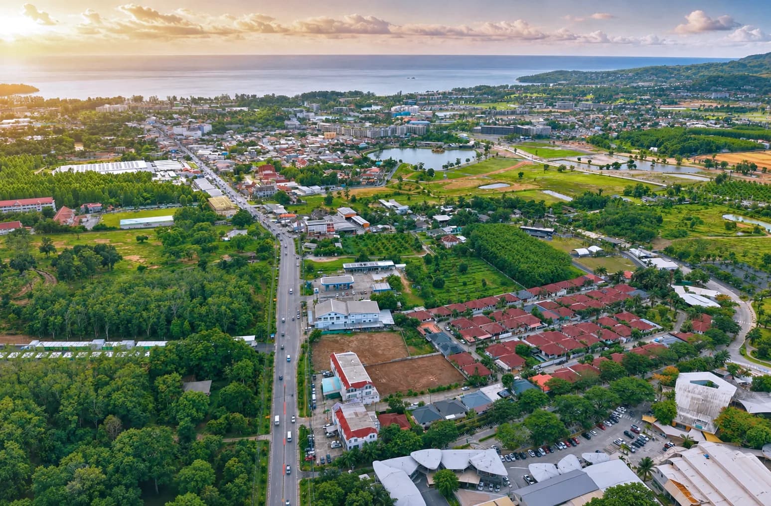 Cherngtalay from above: the site by Srisoonthorn Road, Bang Tao Bay behind